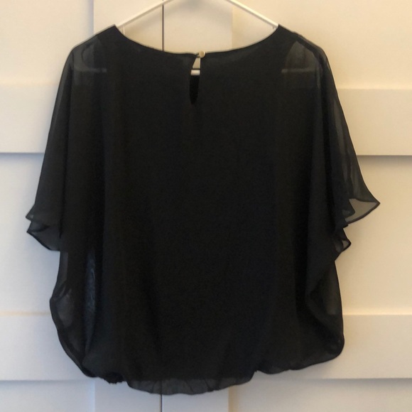 Jennifer Lopez layered top - Picture 3 of 6